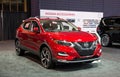 Toronto, Canada - 02 25 2023: Red 2023 Nissan Qashqai J11 compact crossover SUV, produced by Japanese car manufacturer