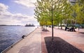 Toronto, Canada - 05 20 2018: Spring view along Toronto Waters Edge Promenade with people having rest on a bench Royalty Free Stock Photo