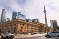 TORONTO, CANADA - 06 05 2021: Sunny summer day view with Union Station building in foreground, CN Tower and glassy