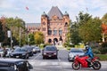 Toronto, Canada - 10 20 2018: Traffic on the College street and Queens Park in front of Legislative Assembly of Ontario Royalty Free Stock Photo