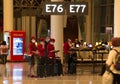 TORONTO, CANADA - 08 20 2020: Turkish Airlines flight crew wearing facial masks beside the gate in the empty night hall