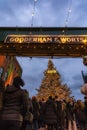 The Toronto Christmas Market Winter Village at the Distillery District. Dior tree and lights over the Gooderham and Worts sign.