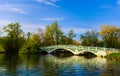 Beautiful inviting view of old vintage retro style bridge at Toronto center island with people walking