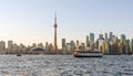 Toronto City downtown skyline at sunset time. Toronto Island Ferry on inner Harbour. Royalty Free Stock Photo