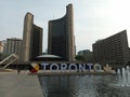 Toronto City Hall Nathan Phillips Square in Toronto Ontario Canada with the Toronto sign in front Royalty Free Stock Photo