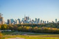 Toronto cityscape skyline view Riverdale park east. People walking in the park