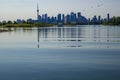 Toronto cityscape with skyscraper, calm lake water. urban skyline background Royalty Free Stock Photo