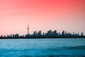 Toronto cityscape with skyscraper, calm lake water. urban skyline background. sunset time Royalty Free Stock Photo