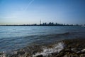 Toronto cityscape with skyscraper, waves lake water. urban skyline silhouette background. blue tone. Royalty Free Stock Photo