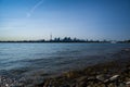 Toronto cityscape with skyscraper, waves lake water. urban skyline silhouette background. blue tone. Royalty Free Stock Photo