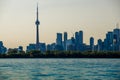 Toronto cityscape with skyscraper, waves lake water. urban skyline silhouette background. blue tone. Royalty Free Stock Photo