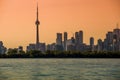 Toronto cityscape with skyscraper, waves lake water. urban skyline silhouette background. blue tone. Royalty Free Stock Photo