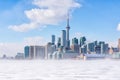 Toronto frozen lake Ontario. Early morning panoramic view of downtown with snow blizzard Royalty Free Stock Photo