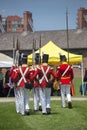 TORONTO - June 20: Men wearing historical military uniform march