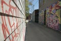 Abstract colourful graffiti paintings on concrete wall. Street art, background, texture