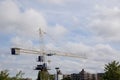 Construction site with crane and blue sky background Royalty Free Stock Photo