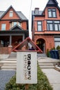 TORONTO, ONTARIO, CANADA - JANUARY 14, 2021: LITTLE FREE LIBRARY OUTSIDE HOMES IN ANNEX NEIGHBOURHOOD.