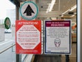 Toronto, Ontario, Canada - July 21, 2020: Warning notice on store shop door to wear protection face mask when entering. Precaution