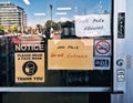 Toronto, Ontario, Canada - June 11, 2020: Warning notice on store shop door window saying to wear protection face mask when