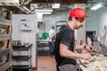 TORONTO, ONTARIO, CANADA - MARCH 6, 2018: CHEF PREPARES FOOD IN KITCHEN