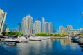 view of Toronto water front in the lake Ontario with boats and yachts parked on water with nice modern residential condo building Royalty Free Stock Photo