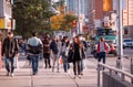 Toronto, Ontario, Canada - 10 03 2022: Torontonians walking along the sidewalk on Younge Street in North York