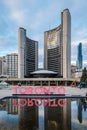 Toronto sign and the New City Hall on Nathan Phillips Square - Toronto, Canada
