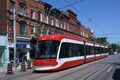 Toronto, streetcars running on tracks Royalty Free Stock Photo