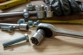 Torque wrench, work tool on wooden background. Hand tool for screw and nut tighten Royalty Free Stock Photo