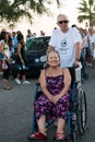 TORRE COLIMENA, ITALY - 1 August 2019, A disabled and elderly lady protests against being discharged to the sea