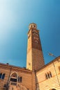 Torre dei Lamberti clock tower of Palazzo della Ragione palace building in Piazza Delle Erbe Royalty Free Stock Photo