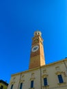 Torre dei Lamberti facade on piazza Erbe in Verona, Italy Royalty Free Stock Photo