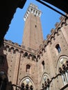 The Torre del mangia is located in the Piazza del Campo, Sienna's premier square in Italy Royalty Free Stock Photo