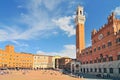 The Torre del Mangia and the Palazzo Publico in The Campo, Siena, Tuscany, Italy