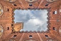 Torre del Mangia in Siena, Italy, seen from the inside of Palazzo Pubblico Royalty Free Stock Photo