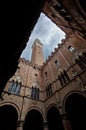 Torre del Mangia courtyard Palazzo Pubblico Town Hall, Siena, Italy, night Royalty Free Stock Photo