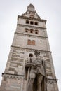 Torre della Ghirlandina tower with ancient statue of Alessandro Tassoni