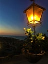 Torre di Palme town in Marche region, Italy. Sunset, sea, light and street lamp