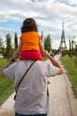 Torrejon de Ardoz, Madrid, Spain; 08-25-2012:  Father carries his daughter on the shoulders Royalty Free Stock Photo