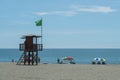 Torremolinos, Malaga, Spain, May 11, 2019. people having fun on the beach near a coast guard tower