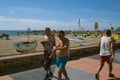 Torremolinos, Malaga, Spain, may 8, 2019. People walking at promenade Royalty Free Stock Photo