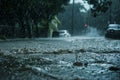 Torrential rains pour down, a deluge unleashed by the hurricane, flooding streets and overwhelming drains