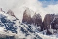 Torres del Paine peaks coming from clouds