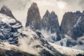 Torres del Paine peaks coming from clouds