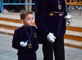 Torrevieja, Spain - April 7, 2023:Little boy participating in Holy Week procession in Spain