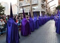 Torrevieja, Spain - April 7, 2023: Nazarenos during Semana Santa procession in Spain