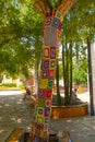 TORREVIEJA, SPAIN: The beautiful tree near the church is decorated with knitted fabric