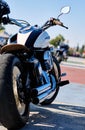 Biker hang out outdoors, close up rear back view modern motorcycle Royalty Free Stock Photo