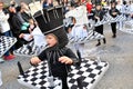 TORREVIEJA, SPAIN FEBRUARY 12, 2023: Kids in a colorful carnival costumes at a festive parade, Alicante, Costa blanca region.