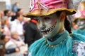 TORREVIEJA, SPAIN FEBRUARY 12, 2023: Participants dressed in a colorful carnival costumes on the street during the traditional